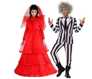 woman and man dressed in Beetlejuice Halloween costumes