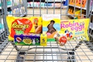 reese's, russell stover, robin eggs, cadbury, mandm's easter candies in a shopping cart