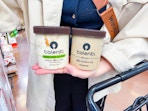 hand holding talenti gelato pints