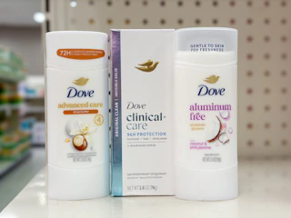 3 dove deodorants sitting on a target shelf