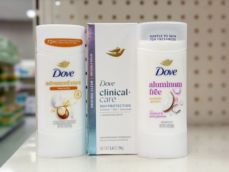 3 dove deodorants sitting on a target shelf