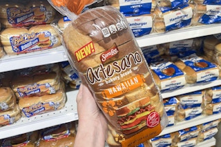 hand holding sara lee hawaiian bread at meijer