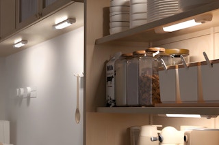 Two LED lights are mounted under cabinets and two LED lights are mounted under shelves