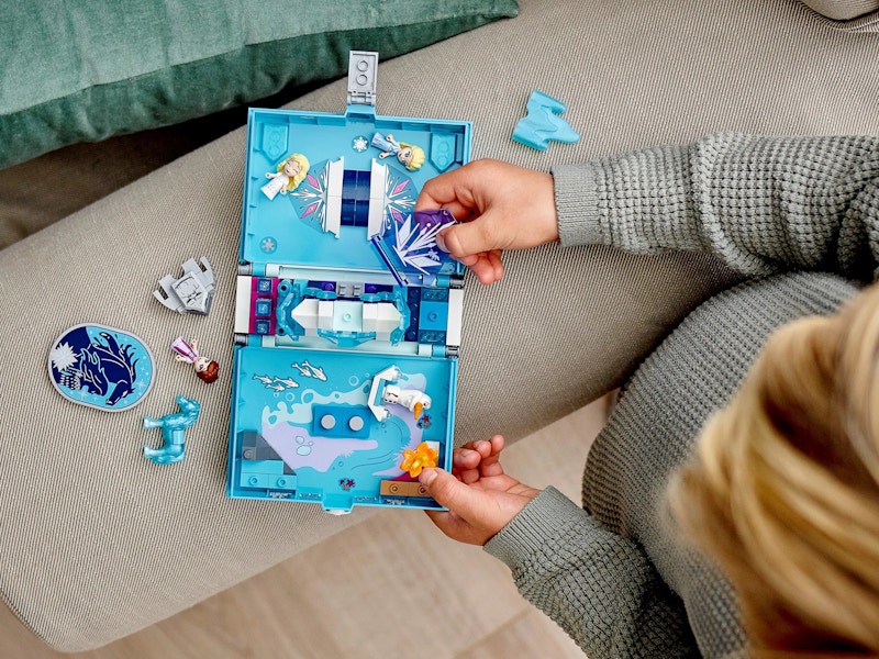 amazon lego sets - A kid playing with a storybook Lego set