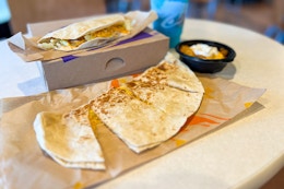 Today Is the Taco Bell Tuesday Drop: It's Your Chance to Win a $1 Quesadilla  card image