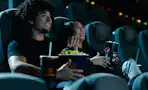 people watching a movie at Regal Cinema