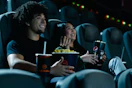 people watching a movie at Regal Cinema