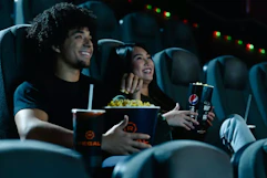 people watching a movie at Regal Cinema