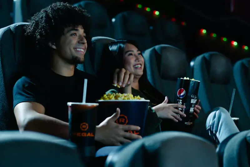 people watching a movie at Regal Cinema