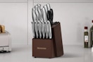 Kitchen knife set block on a kitchen counter.