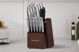 Kitchen knife set block on a kitchen counter.