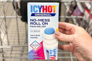 hand holding icy hot roll on