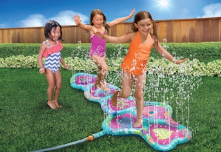 kids playing on a mermaid sprinkler hopscotch