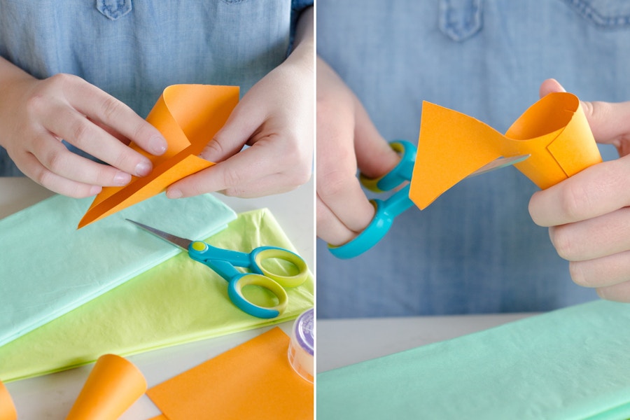 Create a carrot garland with cardstock and tissue paper.