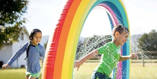 until gone large inflatable rainbow arch sprinkler stock image 2023 1679499951 1679499951