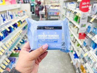 hand holding neutrogena makeup wipes in walgreens