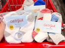 3 packs of cat & jack kids' socks sitting in a target cart