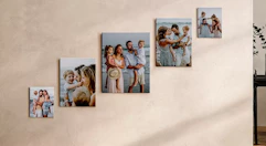 family photos on canvas on a wall