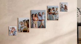 family photos on canvas on a wall