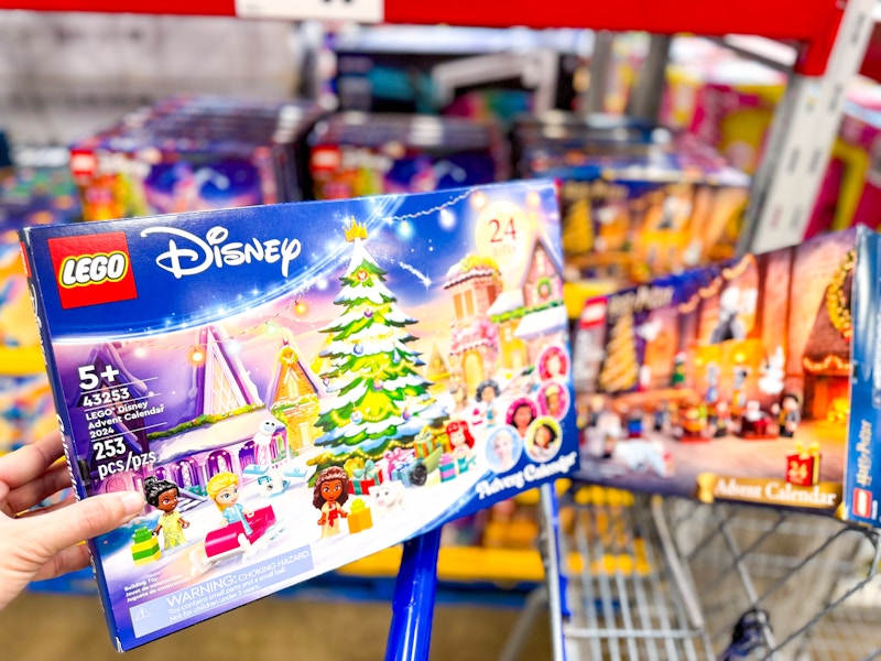 person holding a lego disney advent calendar