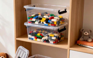 Lego bricks in storage bins on a shelf