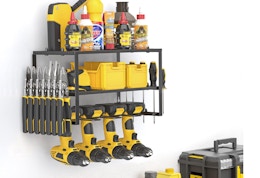 a power tool organizer on the wall with yellow tools