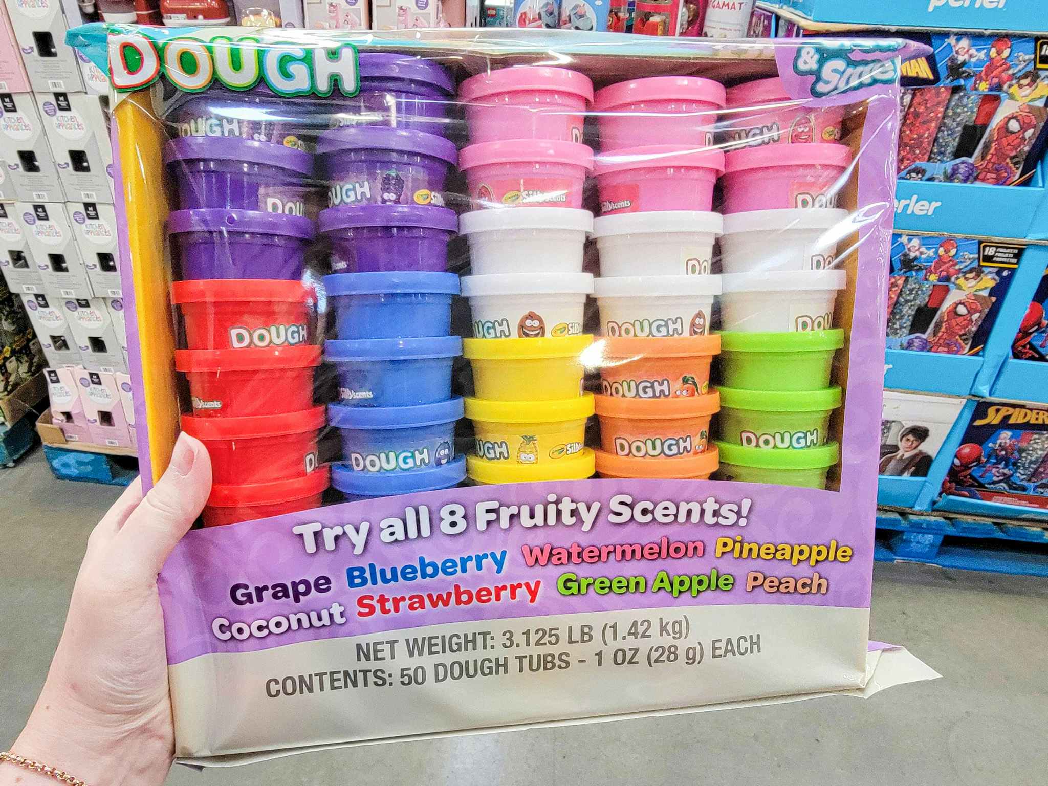 hand holding a 50-pack of crayola silly scent dough