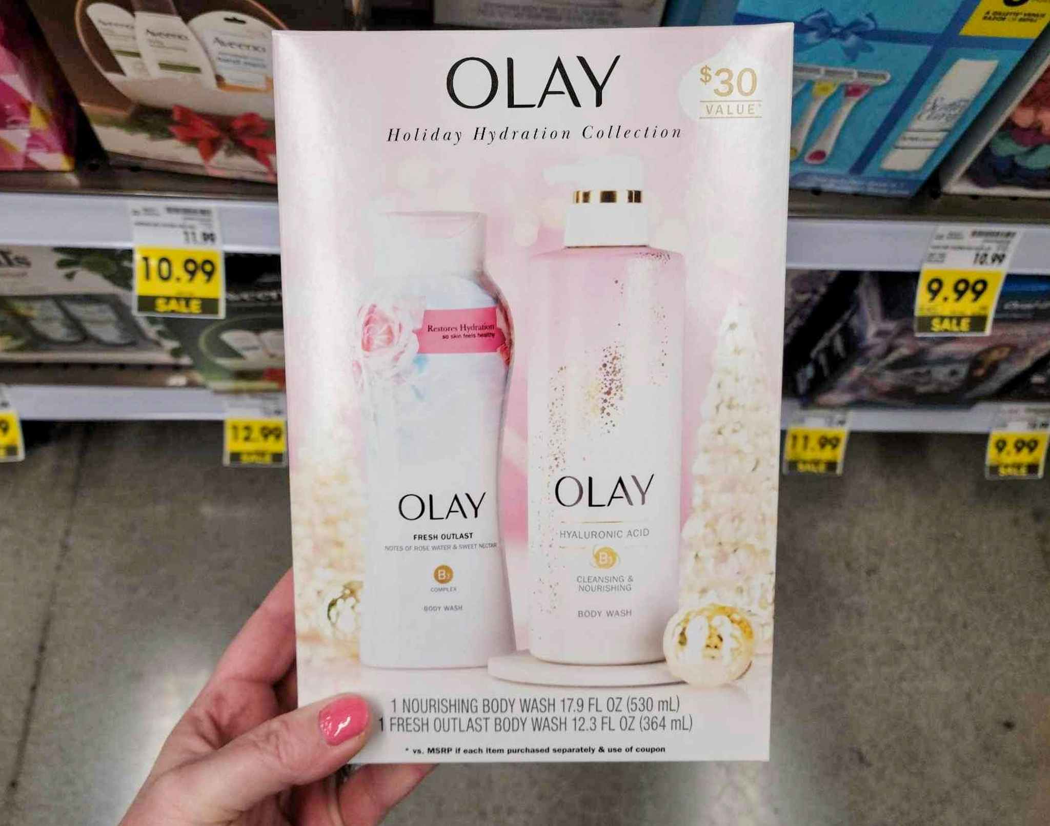 hand holding kroger olay gift set 