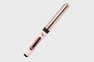 a pink curling wand