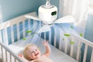 a baby under a portable fan