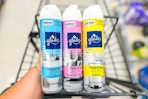 hand holding glade fights odors air freshener sprays