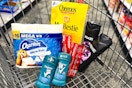 charmin toilet paper, degree deodorant, colgate toothpaste, axe body wash, and cheerios cereal in a cart