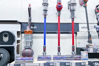 dyson vacuums sitting on a target shelf