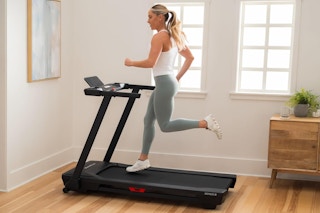 Woman running on NordicTrack T Series Treadmill