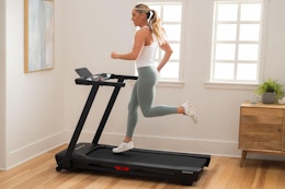 Woman running on NordicTrack T Series Treadmill