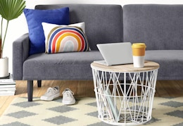 Save 30% on This Room Essentials Futon Sofa at Target — Only $160 card image