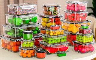 food containers on a table full of food