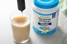 Orgain protein powder being used in drink