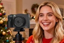 woman using camera at Christmas event