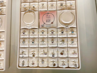 pandora jewelry charms on display