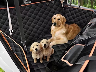a dog car seat cover with dogs on it