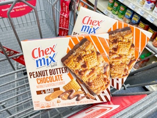 two boxes of Chex Mix bars in shopping cart