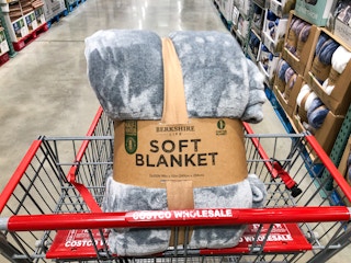 grey blanket in a cart