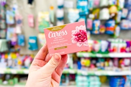 hand holding caress bar soap at dollar tree
