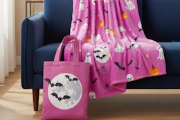 a halloween throw and treat bag