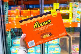 hand holding reese's desserts cups at costco