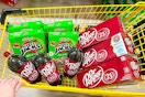 4 boxes of apple jacks, 3 dr pepper 12-packs, and 3 dr pepper 2-liters in a cart
