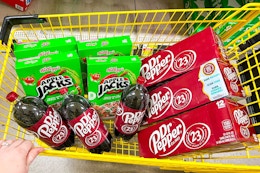 4 boxes of apple jacks, 3 dr pepper 12-packs, and 3 dr pepper 2-liters in a cart