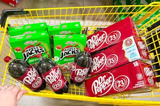 4 boxes of apple jacks, 3 dr pepper 12-packs, and 3 dr pepper 2-liters in a cart