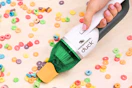 Lifestyle image of the Horsepower Duck handheld vacuum used to clean up spilt cereal
